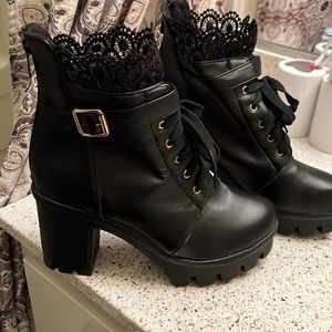 Black ankle high boots with lace accent